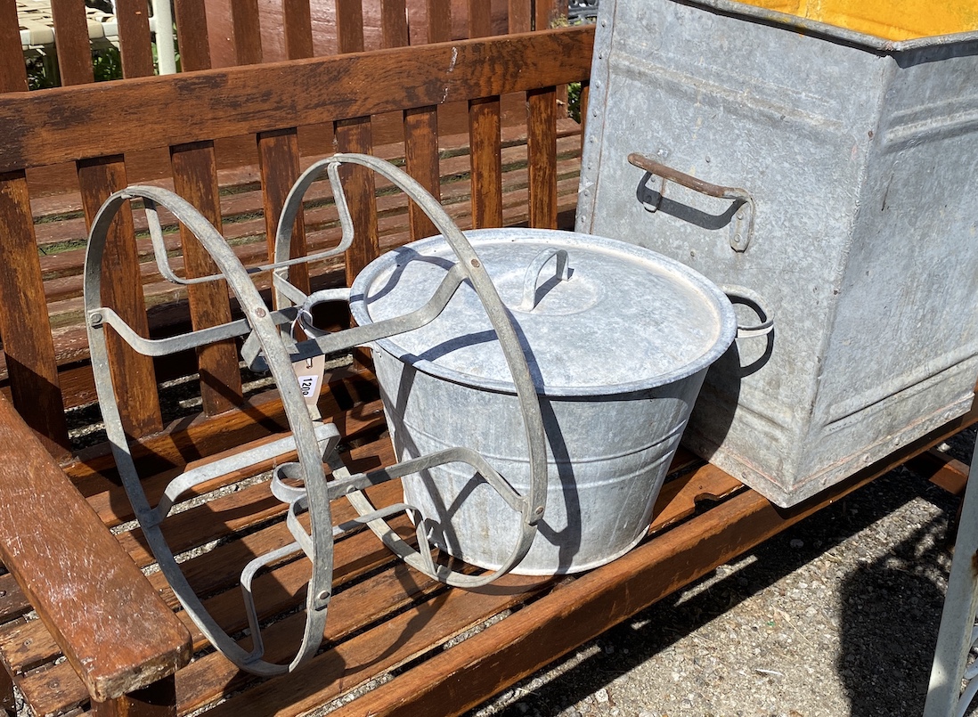 A vintage galvanised square grain bin, height 55cm, a circular lidded container and a hose reel